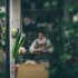 Small business owner working at a shop counter