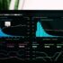 Laptop screen showing a search analytics dashboard with charts
