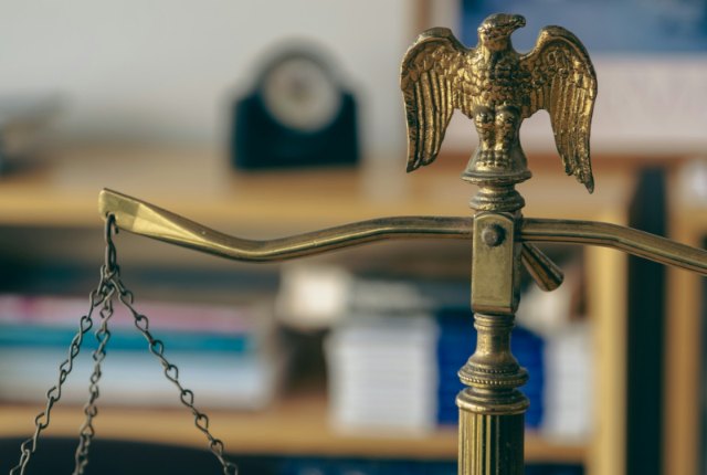 Courtroom bench representing the legal case over social media design