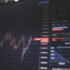 Financial chart showing a sharp decline on a screen